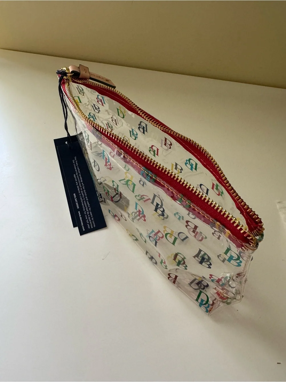 Brand New Dooney & Bourke IT On The Go Clear Signature Cosmetic Case See Through